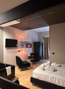 Eterna Suites Roma客房内的一张或多张床位