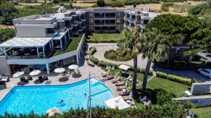 Bazén v ubytování Elysion Hotel nebo v jeho okolí