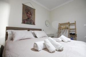 Postel nebo postele na pokoji v ubytování Villa Reve de Tirana