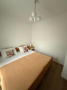 Postel nebo postele na pokoji v ubytování Apartments Kurilić