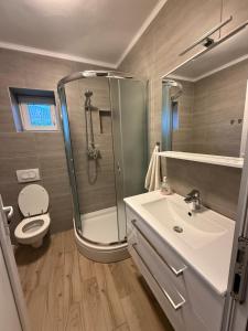 Koupelna v ubytování Apartments Kurilić