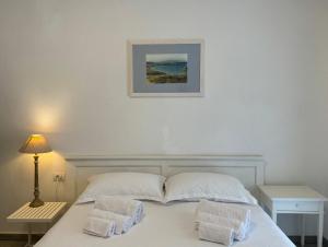 En eller flere senge i et værelse på Casa Efix - Residence Il Gabbiano + 31 billeder