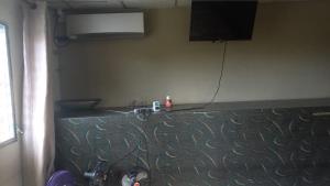 Télévision ou salle de divertissement dans l'établissement PaCasa Hostel