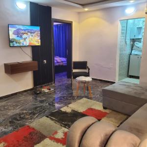 Μια τηλεόραση ή/και κέντρο ψυχαγωγίας στο WELTONS Apartment BABA YUSUF