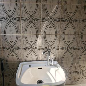 Ένα μπάνιο στο WELTONS Apartment BABA YUSUF