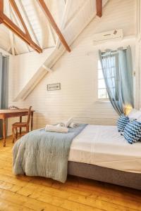 Ένα ή περισσότερα κρεβάτια σε δωμάτιο στο Villa Fleur de Sel