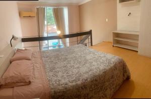 Postel nebo postele na pokoji v ubytování Saint Sebastian ap202-flat com hidro, ate 4pessoa! + 15 fotografií