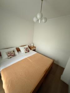 Postel nebo postele na pokoji v ubytování Apartments Kurilić