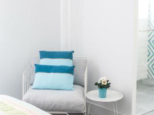 Postel nebo postele na pokoji v ubytování Hostal La Casa Sanlúcar