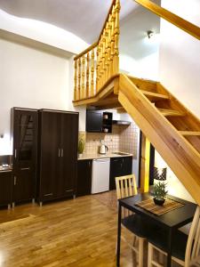 Kuchyňa alebo kuchynka v ubytovaní Safona - Pantheon Apartments