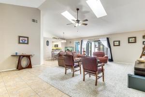 a living room with a couch and chairs at Swim, Golf and Relax Lovely Home in Lake Mary in Lake Mary
