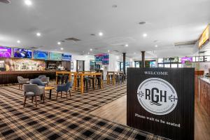 TV o dispositivi per l'intrattenimento presso Reef Gateway Hotel