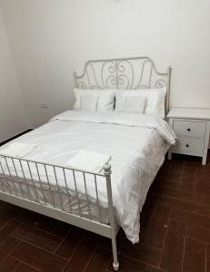 Postel nebo postele na pokoji v ubytování Aladdin guest House