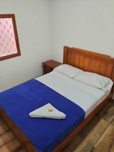 Postel nebo postele na pokoji v ubytování Hotel Café Arábico