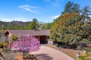an image of a house with trees at Summit Lodge- Sleeps 10, 4 Full Bath, Pet Friendly in Prescott