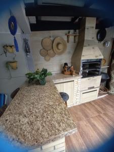 Kuchyň nebo kuchyňský kout v ubytování Kitnet Guaíba Casa Nice + 3 fotografie