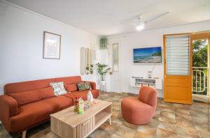 Χώρος καθιστικού στο Évasion en Martinique appartement cosy avec balcon et vue