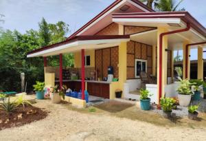 a small house with a porch at turtles place -Chay's Bungalow in San Francisco