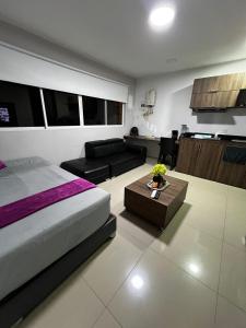 Postel nebo postele na pokoji v ubytování Apartamentos Deluxe La Flora