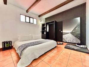 Hotel Boutique Casa Catalá客房内的一张或多张床位