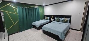 BZ Hostel Cebu客房内的一张或多张床位