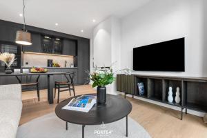 TV a/nebo společenská místnost v ubytování Tribeca Suite List auf Sylt