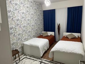 Ένα ή περισσότερα κρεβάτια σε δωμάτιο στο Rest House +26 φωτογραφίες