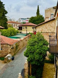 a view of a house with a swimming pool at Adria Inn in Antalya