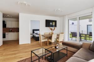 TV a/nebo společenská místnost v ubytování Symphony Apartments Vienna - Garden, Terrace and Grill