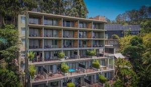 an image of an apartment building with balconies at Ella Flower Garden Resort in Ella