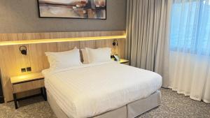 Letto o letti in una camera di فندق آرام النسيم