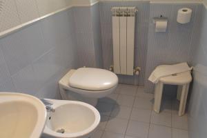 Koupelna v ubytování Hotel Armando' s