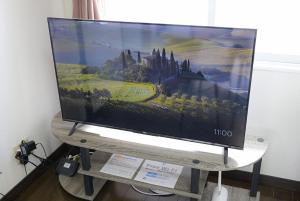 TV a/nebo společenská místnost v ubytování ROOMzero 5号室