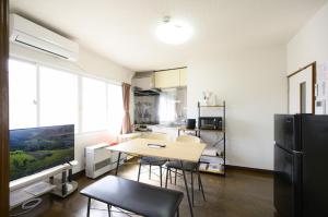 Kuchyň nebo kuchyňský kout v ubytování ROOMzero 5号室 + 15 fotografií