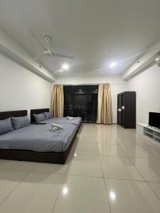 a large bedroom with a bed and a television at ISoHo i-City Studio 2 beds in Shah Alam +17 photos