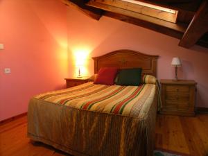 Postel nebo postele na pokoji v ubytování Casa Rural La Regoria