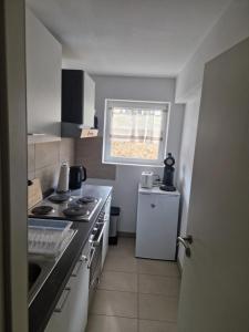 Kuchyň nebo kuchyňský kout v ubytování Ferienwohnung am Waldrand + 6 fotografií