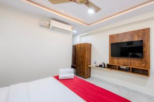 TV a/nebo společenská místnost v ubytování Hotel Advith Suites + 28 fotografií