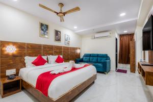 Postel nebo postele na pokoji v ubytování Hotel Advith Suites