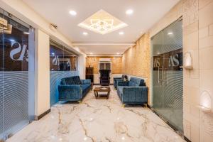 Posezení v ubytování Hotel Advith Suites