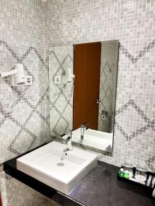 Kopalnica v nastanitvi SM Tower Hotel and Convention Berau