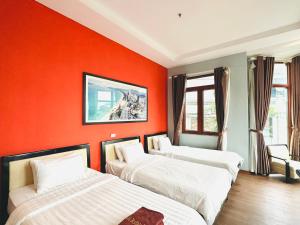 Letto o letti in una camera di Hanoi Buffalo Hostel