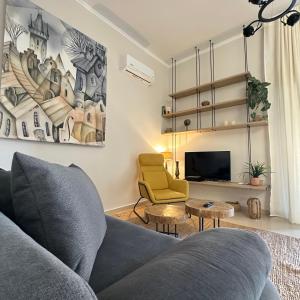 Posezení v ubytování Nafsika Luxe edition Oreon Suites + 34 fotografií