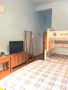 Park One B&B Zhangjiajie Forest Park Scenic Area Shop客房内的一张或多张床位
