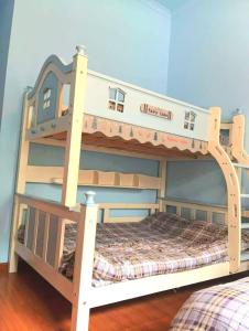 Park One B&B Zhangjiajie Forest Park Scenic Area Shop客房内的一张或多张床位