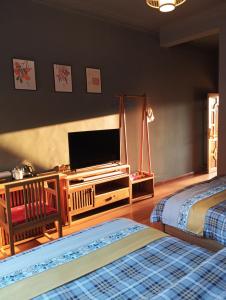 Park One B&B Zhangjiajie Forest Park Scenic Area Shop客房内的一张或多张床位