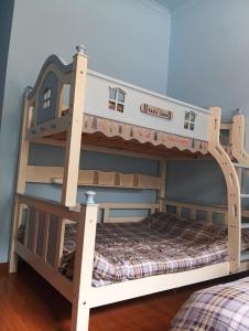 Park One B&B Zhangjiajie Forest Park Scenic Area Shop客房内的一张或多张床位