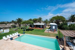 an image of a villa with a swimming pool at Apartamentos Zahora 37 in Zahora