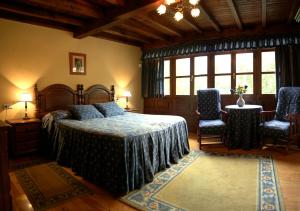 Postel nebo postele na pokoji v ubytování Casa Rural La Regoria