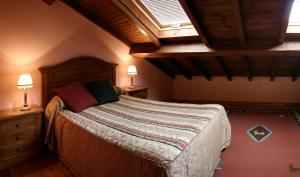 Postel nebo postele na pokoji v ubytování Casa Rural La Regoria